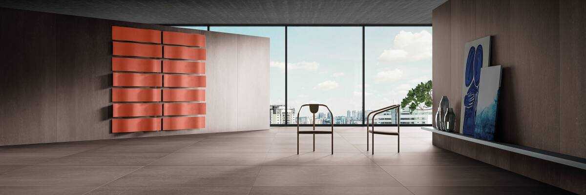 Porcelanato marrom é curinga porque consegue neutralizar cores vivas e brilhantes. Assim, permite o uso de diferentes tonalidades (Projeto: Portobello)